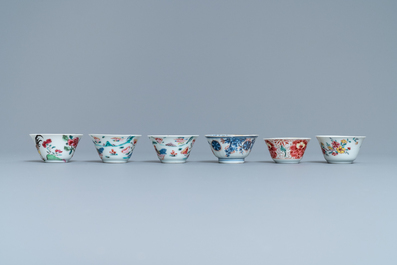 Six Chinese famille rose and Imari-style cups and saucers, Yongzheng/Qianlong