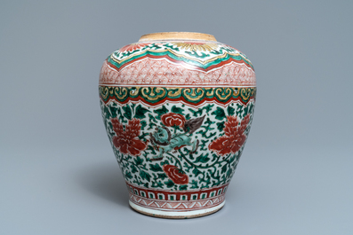 A Chinese wucai vase with buddhist lions and peonies, Transitional period