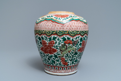 A Chinese wucai vase with buddhist lions and peonies, Transitional period