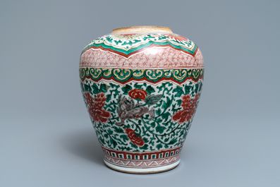 A Chinese wucai vase with buddhist lions and peonies, Transitional period