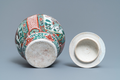 A Chinese wucai &lsquo;mythical beasts&rsquo; vase and cover, Transitional period