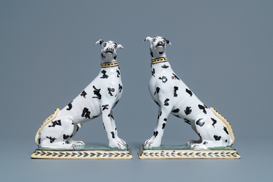 A pair of polychrome Brussels faience models of spotted greyhound dogs, 18th C.