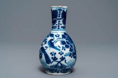 Three Dutch Delft blue and white vases and a chinoiserie jug, 17/18th C.