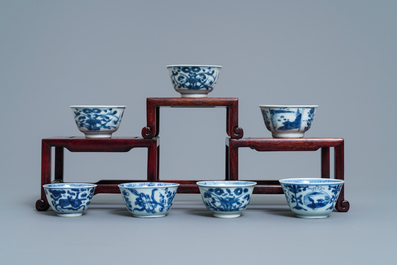 A collection of 22 Chinese blue and white cups and 32 saucers, Kangxi/Qianlong