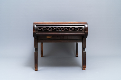 A large Chinese famille rose plaque inset in a wooden table, Republic, 20th C.