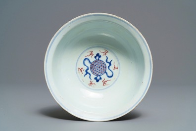 A Chinese blue, white and underglaze red 'Buddhist lion' bowl, Qianlong mark and of the period