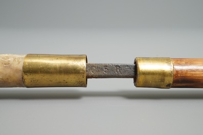 Acht wandelstokken w.o. met steekwapens, dobbelstenen en zilveren grepen, 19e eeuw