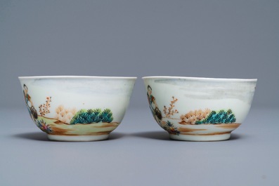 A pair of Chinese famille rose 'European subject' cups and saucers, Qianlong