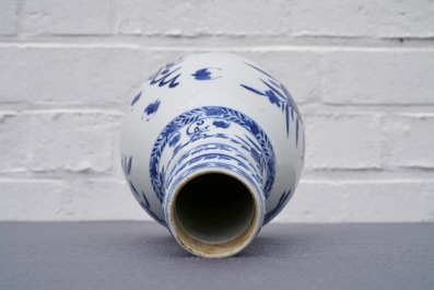 A Chinese blue and white bottle vase, Kangxi mark, 19th C.