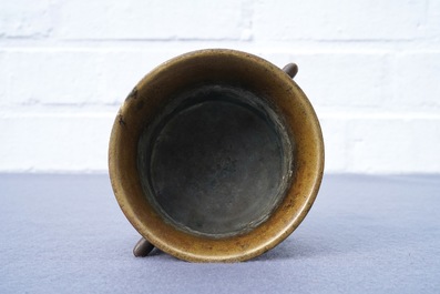 A Chinese bronze tripod censer, Xuande mark, 17/18th C.