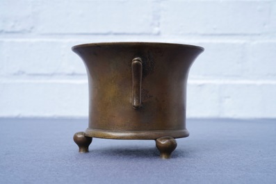 A Chinese bronze tripod censer, Xuande mark, 17/18th C.