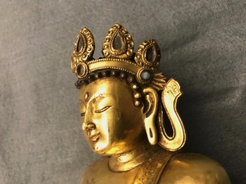 A Sino-Tibetan gilt bronze figure of Buddha Shakyamuni, 17/18th C.