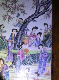 A large Chinese famille rose plaque inset in a wooden table, Republic, 20th C.