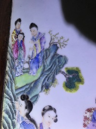 A large Chinese famille rose plaque inset in a wooden table, Republic, 20th C.