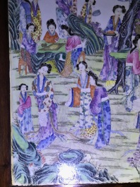 A large Chinese famille rose plaque inset in a wooden table, Republic, 20th C.