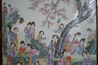 A large Chinese famille rose plaque inset in a wooden table, Republic, 20th C.