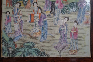 A large Chinese famille rose plaque inset in a wooden table, Republic, 20th C.