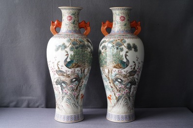 A pair of Chinese famille rose 'peacock' vases, Qianlong mark, Republic, 20th C.