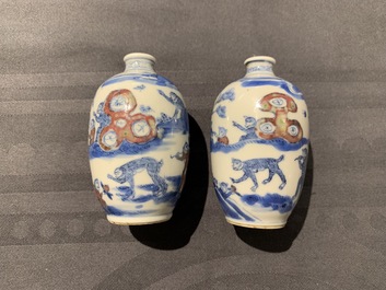 A pair of Chinese blue, white and underglaze red '16 monkeys' snuff bottles, Yongzheng mark, 19th C.