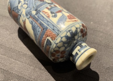 Three Chinese blue, white and underglaze red snuff bottles, Yongzheng marks, 19th C.