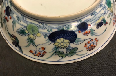 A pair of Chinese doucai 'ducks and lotus pond' plates, Chenghua mark, 18th C.