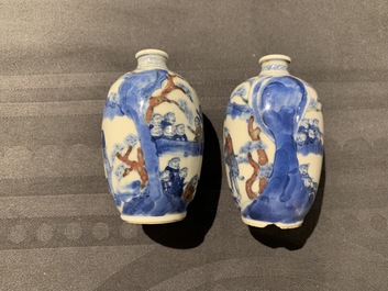 A pair of Chinese blue, white and underglaze red '16 monkeys' snuff bottles, Yongzheng mark, 19th C.