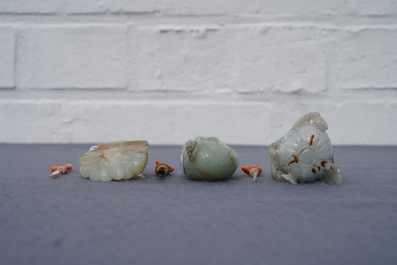 Three Chinese jade snuff bottles with coral stoppers, 19/20th C.