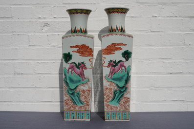 A pair of square Chinese famille rose 'mythical beasts' vases, 19/20th C.