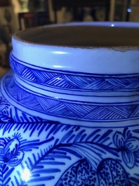 A pair of large Dutch Delft blue and white vases and covers, 18th C.