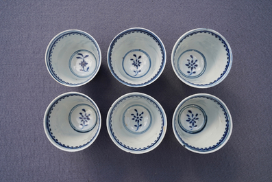 Twelve Chinese blue and white cups and saucers, 19th C.