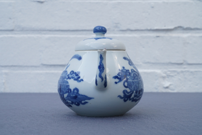 A Chinese blue and white teapot and cover with antiquities, Jiajing mark, Kangxi