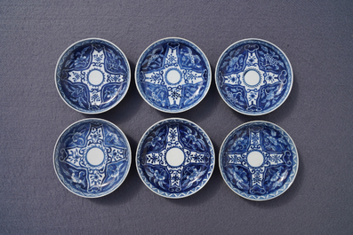 Twelve Chinese blue and white cups and saucers, 19th C.