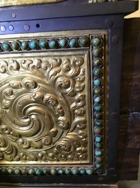 A turquoise-inlaid gilt bronze and copper repouss&eacute; 'tepchog' folding altar table, Tibet, 19th C.