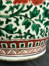 A Chinese wucai vase with buddhist lions and peonies, Transitional period