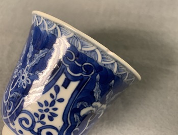 Twelve Chinese blue and white cups and saucers, 19th C.