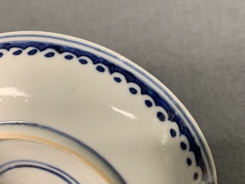 Twelve Chinese blue and white cups and saucers, 19th C.