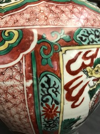 A Chinese wucai &lsquo;mythical beasts&rsquo; vase and cover, Transitional period