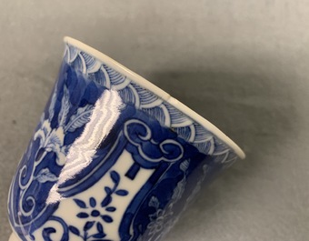 Twelve Chinese blue and white cups and saucers, 19th C.