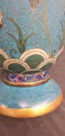 A Chinese cloisonn&eacute; rouleau vase and four jardini&egrave;res, 19/20th C.