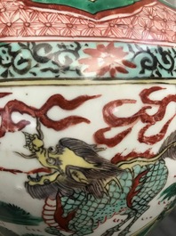 A Chinese wucai &lsquo;mythical beasts&rsquo; vase and cover, Transitional period