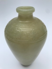 A Chinese light celadon jade relief-decorated meiping vase, 19/20th C.