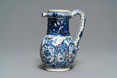 A Dutch Delft blue and white puzzle jug, dated 1737