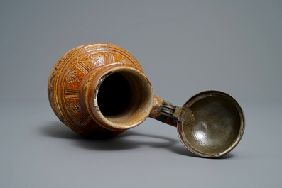 A 'Peasants dance' stoneware jug with pewter lid, Raeren, dated 1578