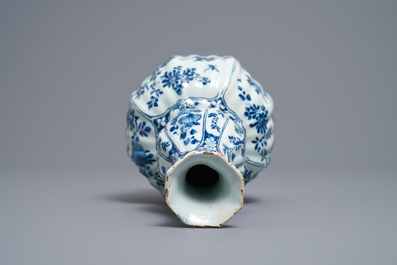 A ribbed Dutch Delft blue and white double gourd vase, early 18th C.