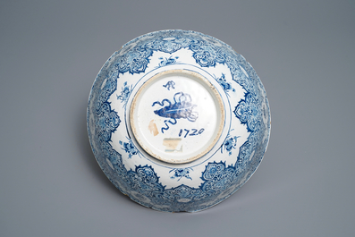 A fine Dutch Delft blue and white 'Commedia dell'arte' bowl, dated 1720