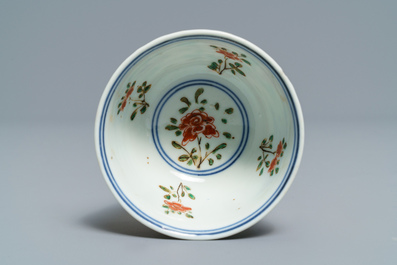 Nine Chinese famille verte cups and saucers with birds among blossoms, Kangxi