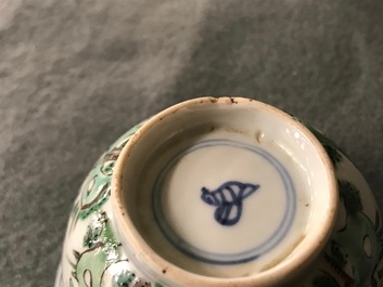 Nine Chinese famille verte cups and saucers with birds among blossoms, Kangxi