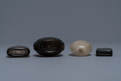 Four Chinese smoky quartz and simulating glass snuff bottles, 18/19th C.
