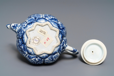 A Chinese blue and white relief-moulded 'lotus flower' teapot and cover, Kangxi