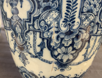 A pair of Dutch Delft blue and white Daniel Marot style vases, early 18th C.